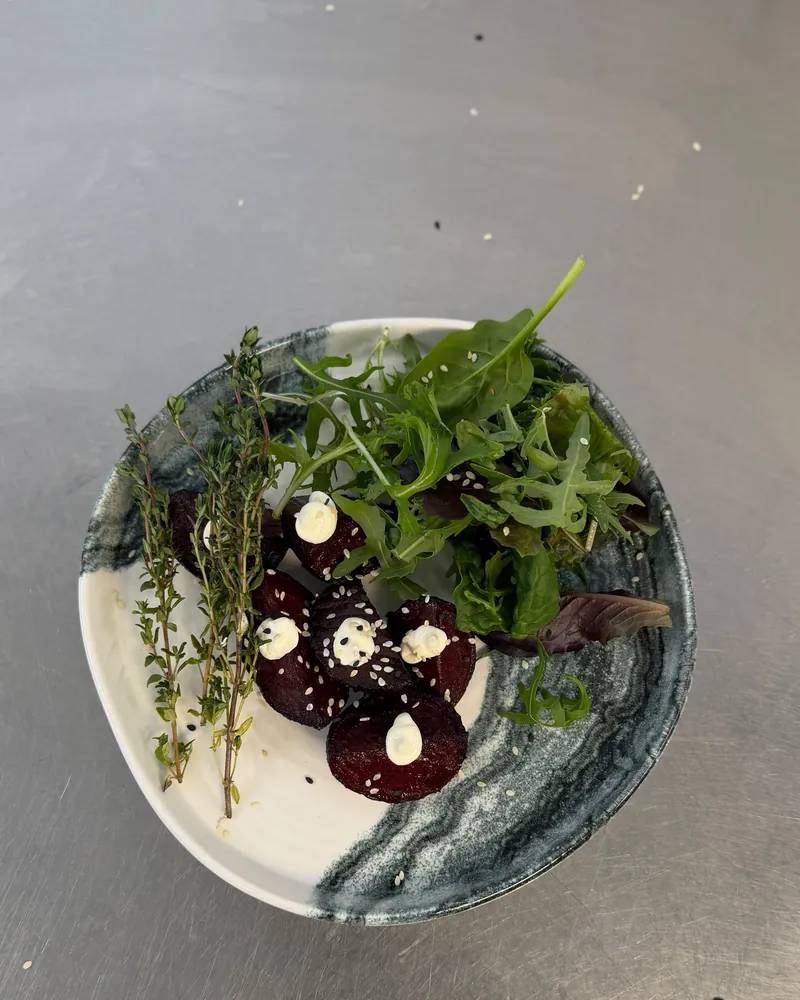 Roasted beetroot with whipped cheese, rocket and thyme